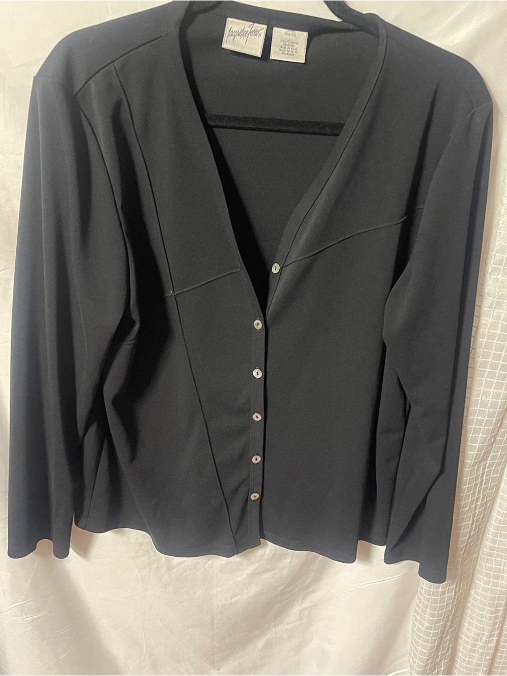 Charcoal Black V-Neck Button-Front Long-Sleeve Top
Versatile charcoal gray top